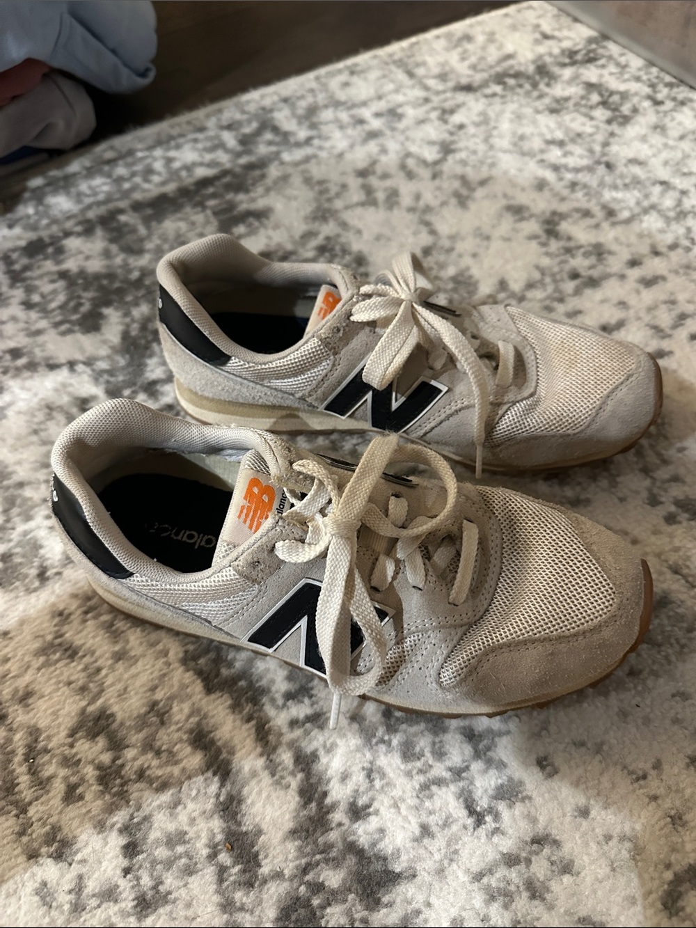 New Balance Beige and Black Lace-Up Sneakers with Orange Logo